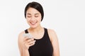 Close up - elegant beautiful asian girl talking with somebody on cellphone Royalty Free Stock Photo