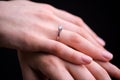 Close up of elegant diamond ring on the finger