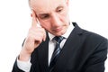 Close-up of elegant man standing making thinking gesture Royalty Free Stock Photo