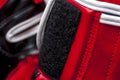 Close-up elements of red boxing leather gloves