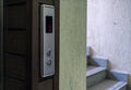 Elevator Control Panel with Stairs in the Background Royalty Free Stock Photo