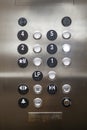 Close-up of elevator control panel with numbered buttons and additional functions Royalty Free Stock Photo