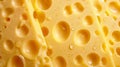 close-up of Emmenthal type cheese seen from above, in pieces