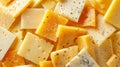 close-up of Emmenthal type cheese seen from above, in pieces