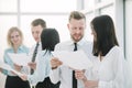 Close up. Manager and employees discussing business documents Royalty Free Stock Photo