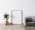 Close up for Empty frame poster interior design in modern living room mock-up ,White background. green couch. Scandinavian style