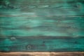 Close up of an empty green blackboard with a hand holding a chalk, ready for writing or drawing