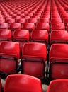 Close-up of the empty red seats in football stadium. Royalty Free Stock Photo