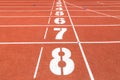 Close up empty running track with numbers Royalty Free Stock Photo