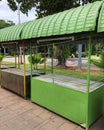 Close up of empty stalls in park