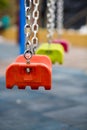 Close up of empty swing in a children play area at park Royalty Free Stock Photo
