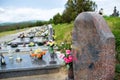 Close up of empty tombstone. Graves, tomb stones and crucifixes on traditional public cemetery