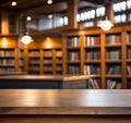 Close-up empty Top of wooden table with Blurred the libraryn  background. Royalty Free Stock Photo