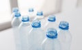 Close up of empty used plastic bottles on table Royalty Free Stock Photo