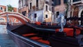 Close-up of empty venetian gondola on Venice canal