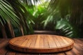 Close up of empty wooden round table on blurred forest background. Mockup for product display