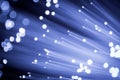 Close up on the ends of a selection of illuminated blue fiber op Royalty Free Stock Photo