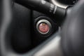 Close up engine car start button. Royalty Free Stock Photo