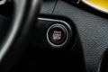 Close up engine car start stop button. Modern car black interior details Royalty Free Stock Photo