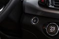 Close up engine car start stop button. Modern car black interior details. Royalty Free Stock Photo