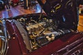 Close-up of an engine of a red Mercedes-Benz W113 car