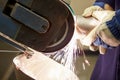 Close Up Of Engineer Using Grinding Machine In Fac