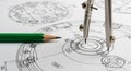 Close Up Of Engineering Blueprint With Compass And Green Pencil technical drawing drafting Royalty Free Stock Photo