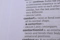 Close Up English Dictionary Page With The Word Reference Of - contort Royalty Free Stock Photo