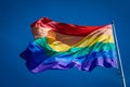 Close up of the enormous rainbow flag flying proud over Harvey Milk Plaza in the Castro district of San Francisco Royalty Free Stock Photo
