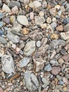 Close-up of eroded rocks and pebbles of a river bed at Pabineau Falls, New Brunswick, Canada Royalty Free Stock Photo