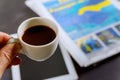 Close up espresso coffee cup on newspaper the table Royalty Free Stock Photo