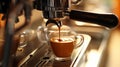 Close up of espresso coffee by using coffee machine