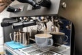 Close-up of espresso pouring from coffee machine. Professional coffee Royalty Free Stock Photo