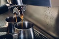 Close-up of espresso pouring from coffee machine Royalty Free Stock Photo