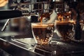 Close-up of espresso pouring from coffee machine. Professional coffee brewing Royalty Free Stock Photo