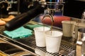 Close-up of espresso pouring from coffee machine Royalty Free Stock Photo