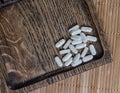 Close-up of ester-c tablets on a wooden background. biologically active supplements topview photo