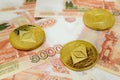 Close-up of Ethereum coins on 5000 Russian rubles banknote. Crypto currency ETC