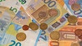 Close up euro banknote and coin background detail