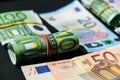 Close up of Euro money roll. Euro banknote set cash money - EU currency. Rolled with rubber euro notes. Banknotes Royalty Free Stock Photo