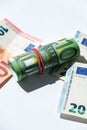 Close up of Euro money roll. Euro banknote set cash money - EU currency. Rolled with rubber euro notes. Banknotes Royalty Free Stock Photo