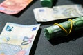 Close up of Euro money roll. Euro banknote set cash money - EU currency. Rolled with rubber euro notes. Banknotes Royalty Free Stock Photo