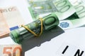 Close up of Euro money roll. Euro banknote set cash money - EU currency. Rolled with rubber euro notes. Banknotes Royalty Free Stock Photo