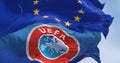 Close-up of European Union and UEFA flags waving in the wind