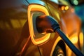 Close up EV car with yellow backlight connected to charging station. AI Generative Royalty Free Stock Photo