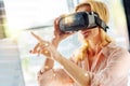 Close up of excited woman wearing virtual reality glasses Royalty Free Stock Photo