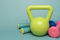 Exercising sport equipment on green table background Royalty Free Stock Photo