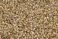 Close up of exfoliated vermiculite, hydrous mineral used as soilless growing medium for plants Royalty Free Stock Photo