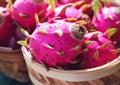 Close up exotic pitaya dragon fruit in market basket.Macro.AI Generative