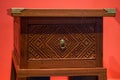 A close-up of an exquisitely carved wooden box